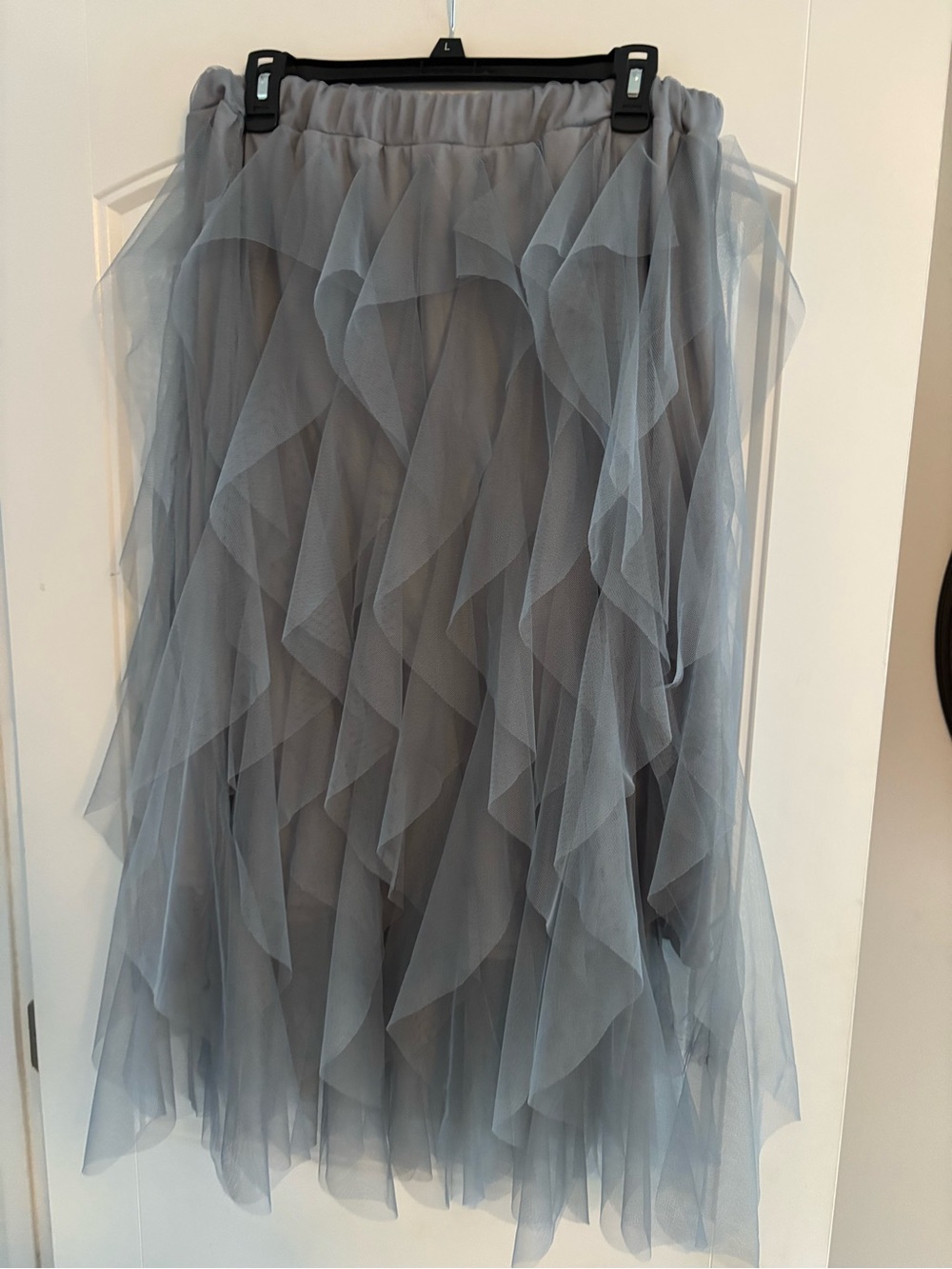 Gray blue tulle skirt.